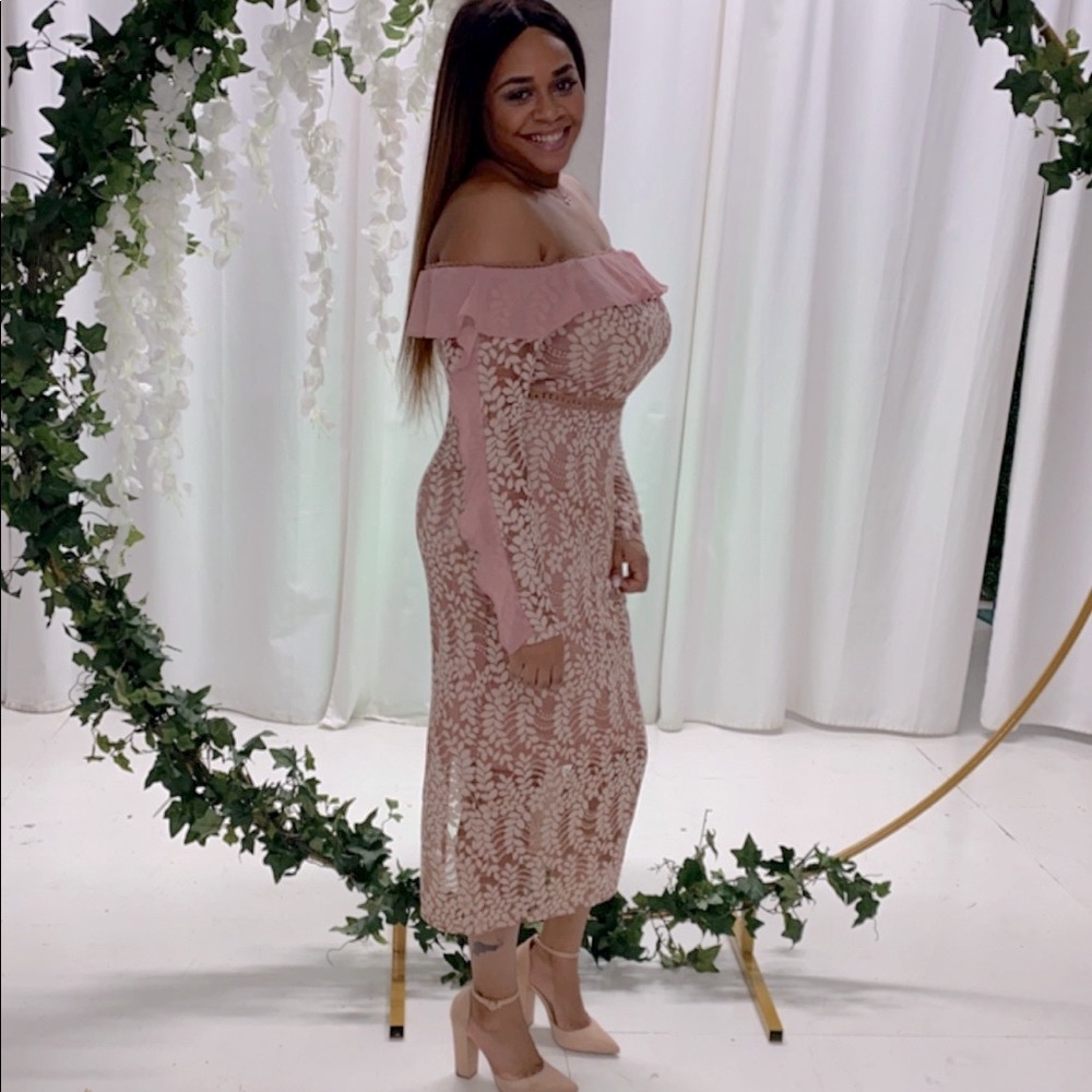 Beautiful off the shoulders dress.